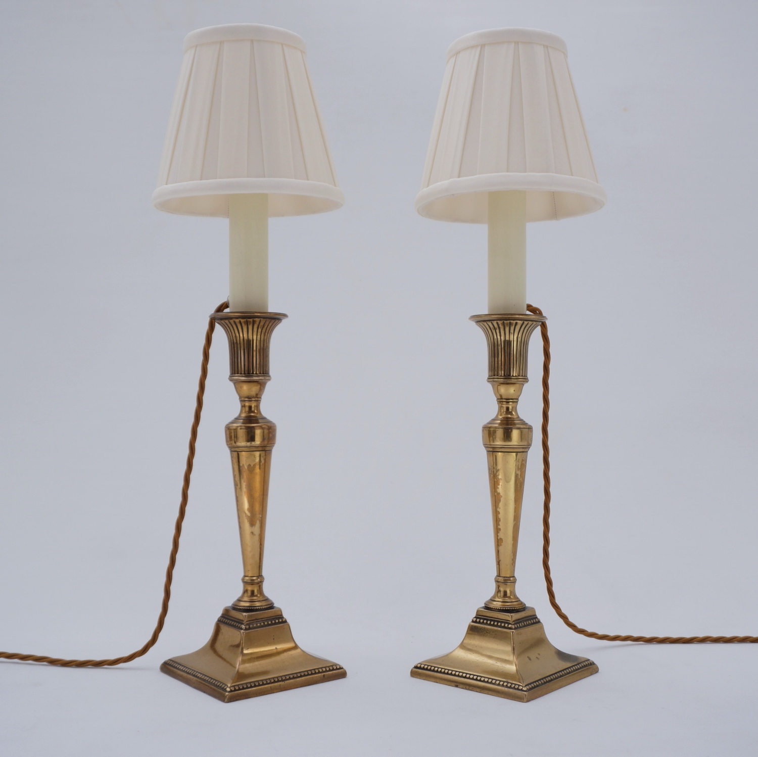 A Pair of French 19th Century Brass Candlesticks Converted into Table  Lamps. - Effetto
