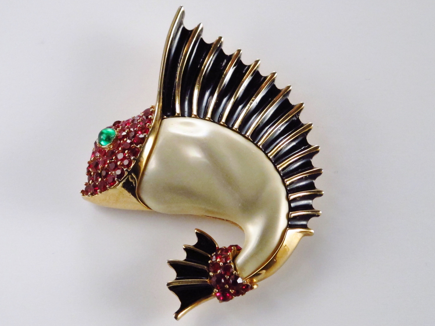 Trifari sail fish brooch gold wash, pearl & black enamel by Norman Bel  Geddes, 1960`s ca, American. in Vintage Pins & Brooches from Roomscape